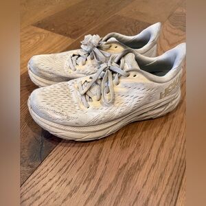 Hoka Women's Clifton Running Shoes in Eggnog/Shifting Sand